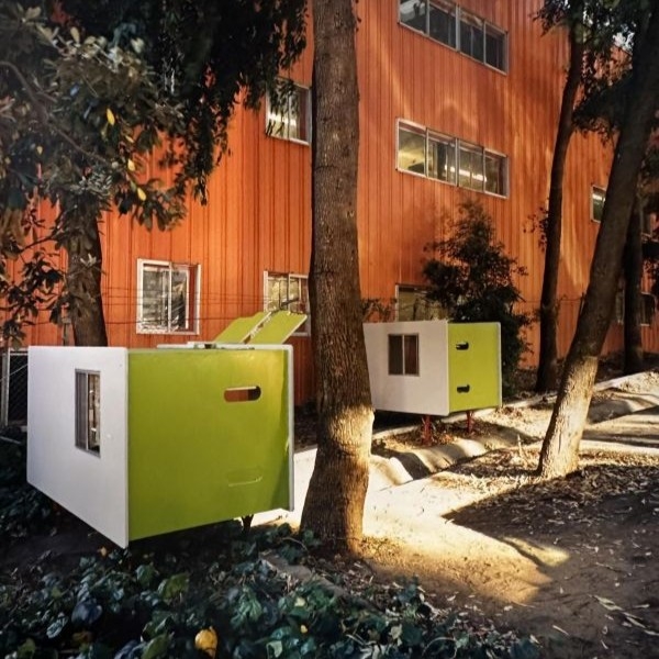 Colorful rectangular outdoor sleeping pods.