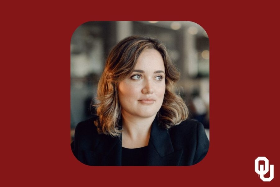 Anna Siprikova with the O U logo.