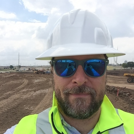 Brent Wall outside in a hard hat.