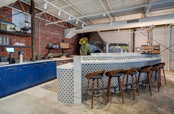 A bar seating area with tile details.