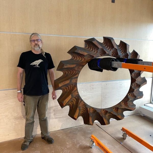 Chris Morrey with sculpture.