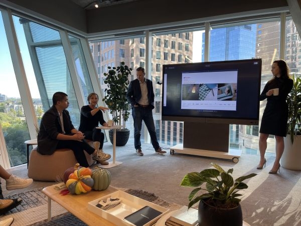 Interior Design professionals giving a presentation about Haworth furniture.