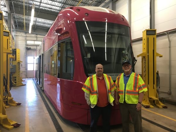 Hopper and his college roommate with the O K C streetcar.
