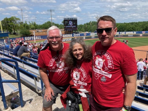 Hopper with family at an OU softball game.
