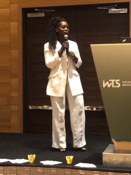 Grace Olaleye speaking at a conference.