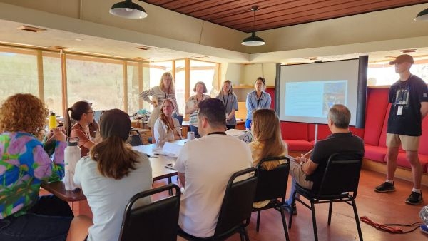 Students presenting inside Taliesin West.