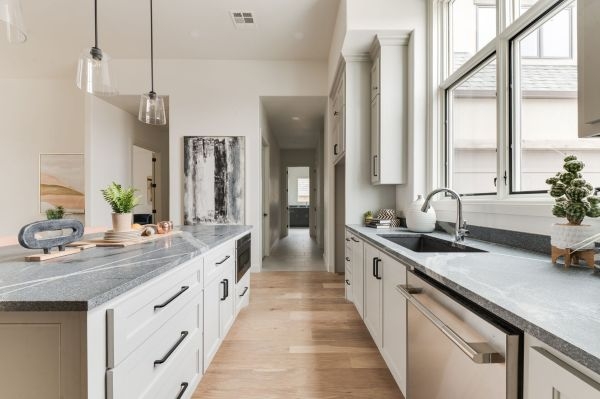 A kitchen and hallway in Punnett Homes' Villas.