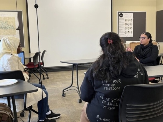 Doctor Contreras speaking with students.