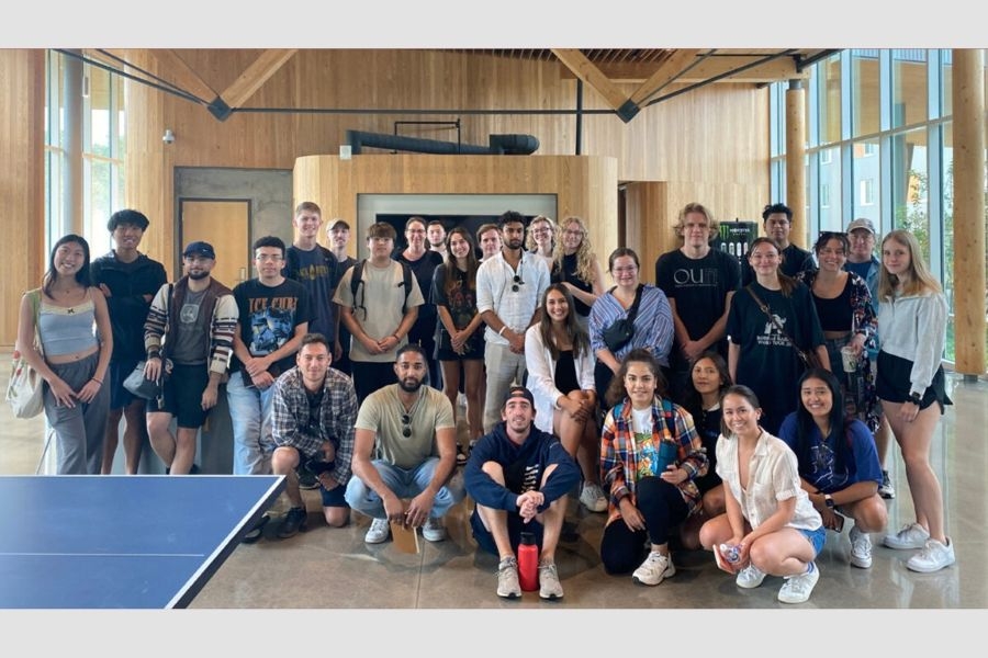 A group photo of Architecture students in Adohi Hall in Fayetteville, Arkansas.