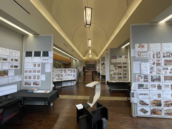 A hall full of printed and phsyical student work.