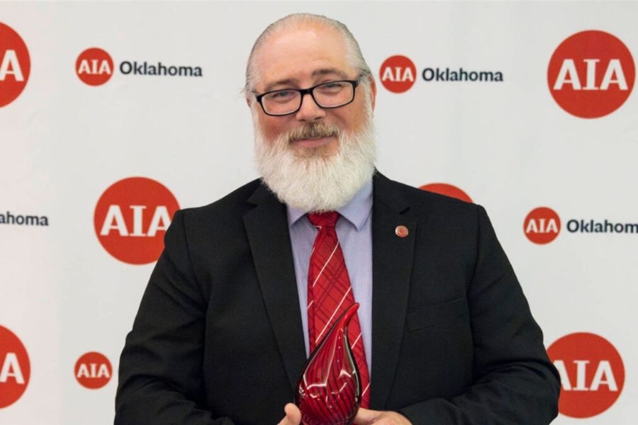 Daniel Butko with his award from A I A Oklahoma.
