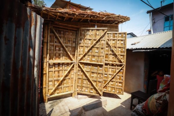 A structure made from woven bamboo.