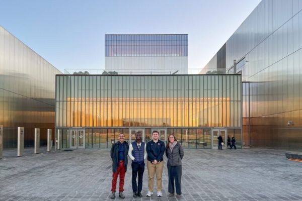 Trey London with three others outside the National Museum of the United States Army.