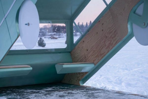 The interior of "Wrong Turn," a warming hut designed by Unearthed Practice.