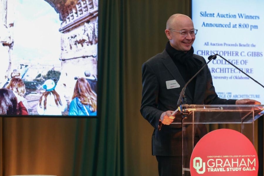 Gibbs Colege dean Hans E. Butzer speaks at the Graham travel study gala.