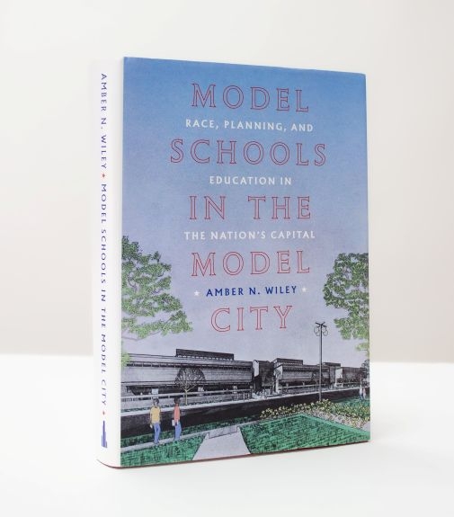 The book Model School in a Model City. 