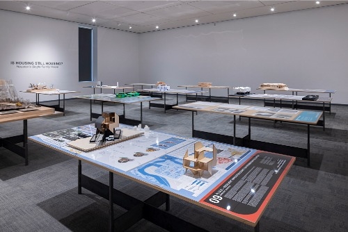 Tables with Rene Peralta's designs at the Is Housing Still Housing exhibit in Houston. 