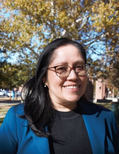 Karla Linares Karla Linares, blue blazer and dark shirt, on the South Oval