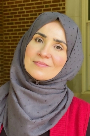 Mukarram Lillard, gray hijab, outside Farzaneh Hall