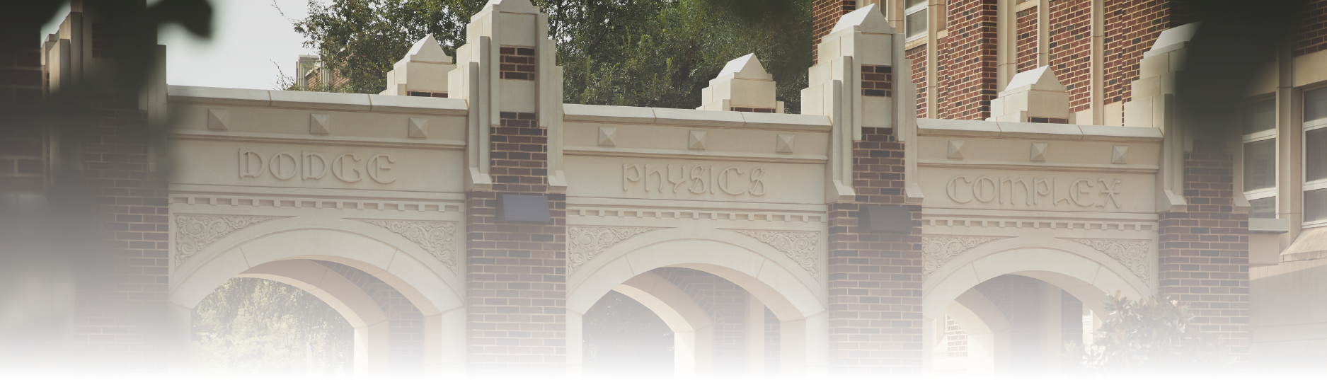 Image of the arches connecting the old and new physics buildings.