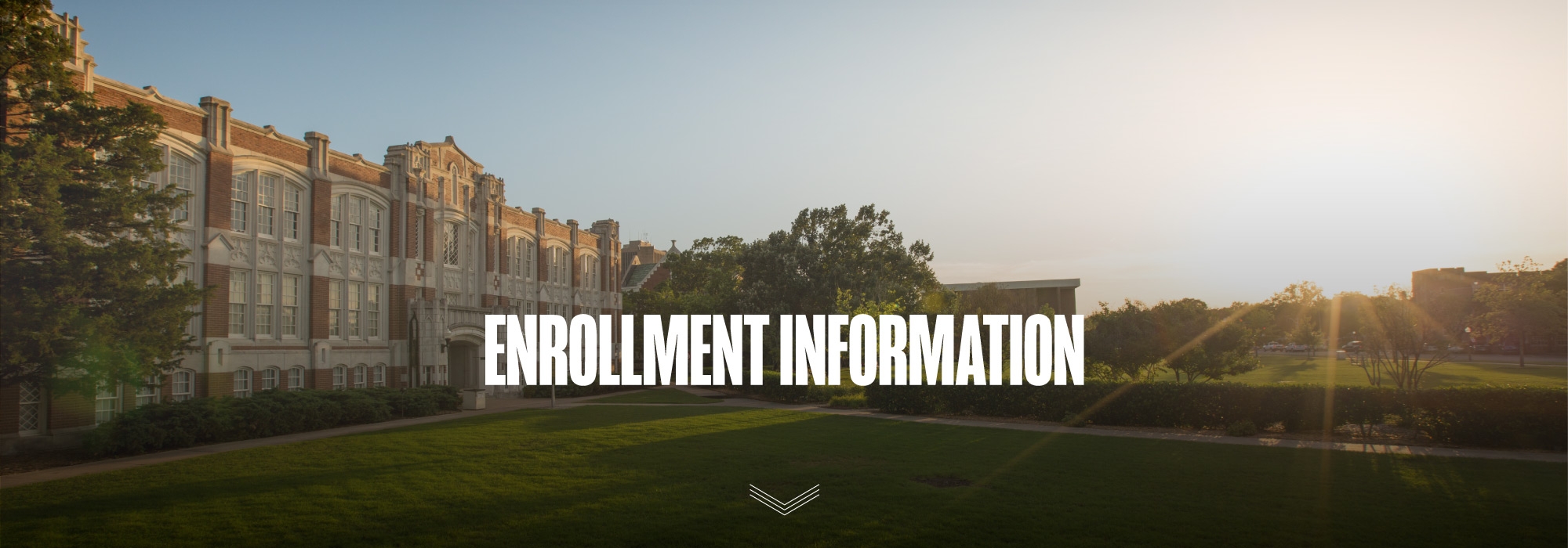 An early morning view of the university visitor's center. Overlay of text that reads "enrollment information".