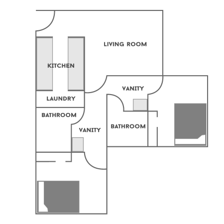 Floor plan for a 2 Bedroom/2 Bathroom at Traditions Square. The floor plan shows two bedrooms. Each bedroom has a full-size bed, a desk with a chair, a dresser and a closet. There are two bathrooms. Each bathroom has a toilet and bathtub, with a sink on the exterior. The living room has a couch, lounging chair and three tables. The kitchen has a bar with stools, sink, stove, microwave and refrigerator. The laundry room has a washer and dryer.