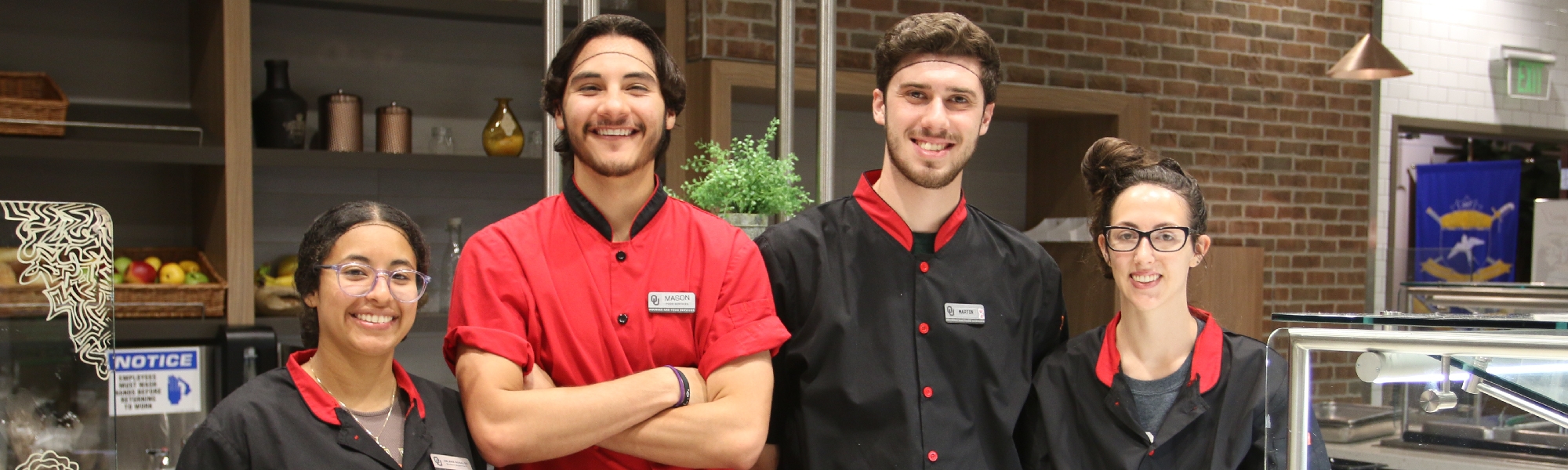 Four OU Food Services employees in the Residential Colleges' Dining Hall