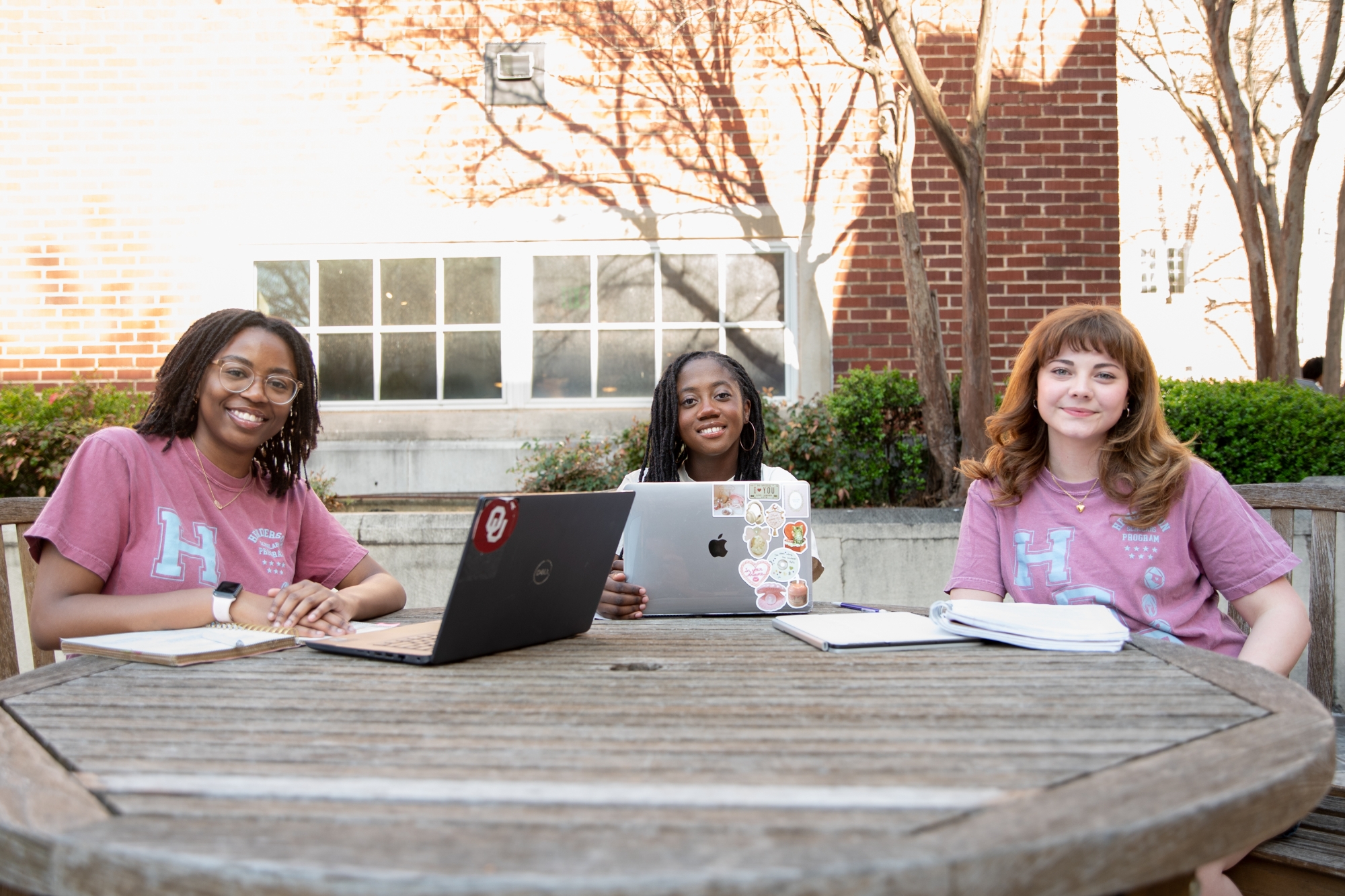 HSP students studying at a table outside. 