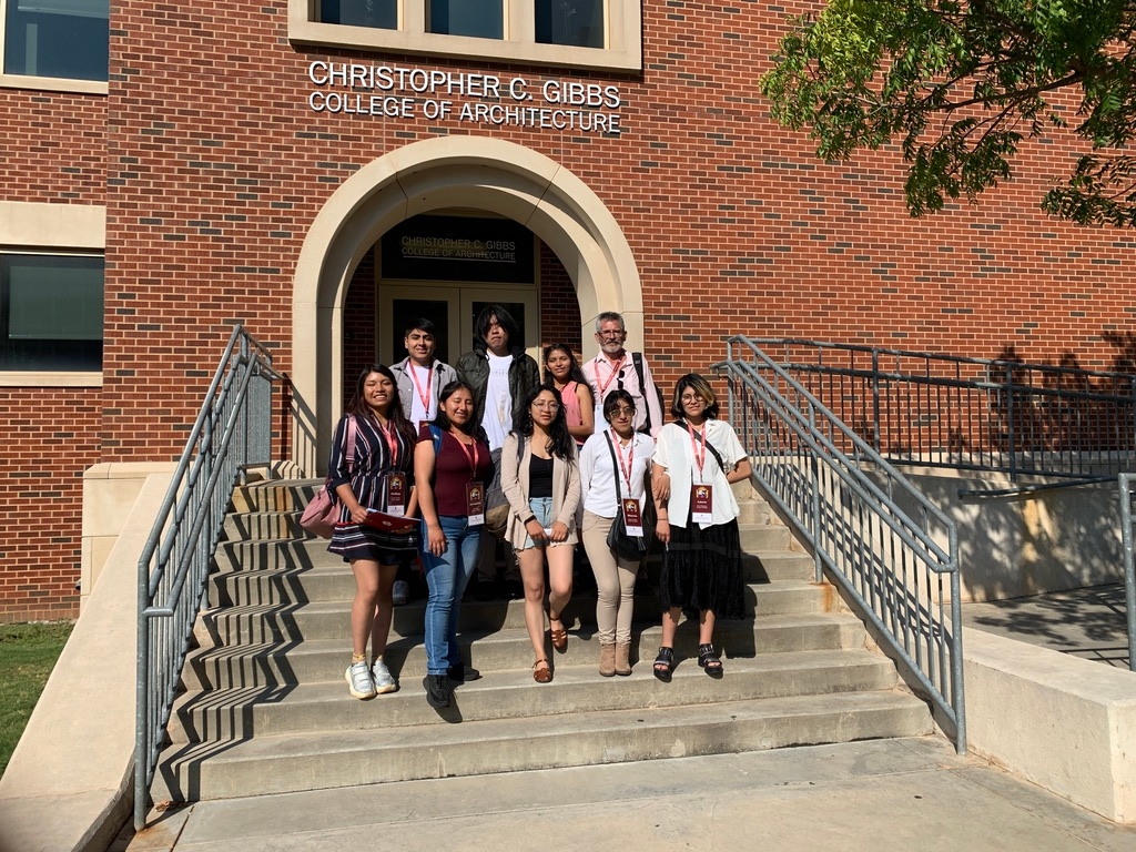 Inti Wasi Students Oustide Arch Building