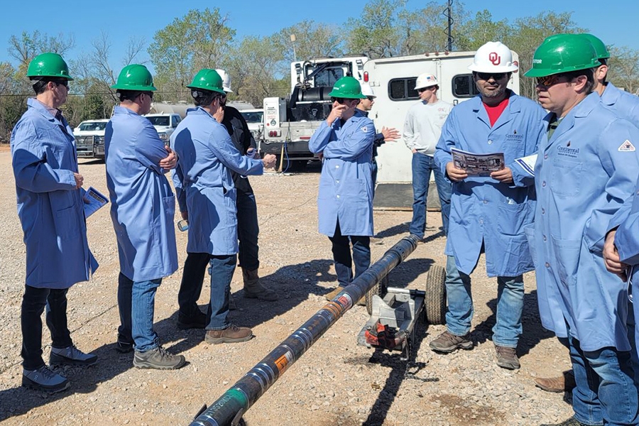 Rouzbeh Moghanloo, Ph.D., leads NDU students on a tour of a fracking site in Grady, OK.