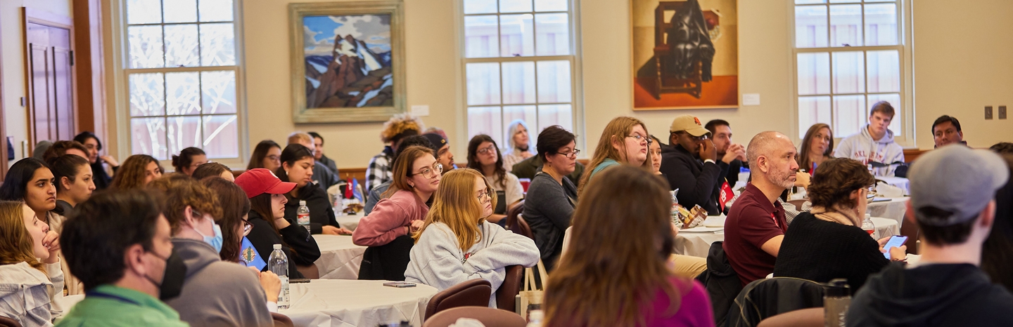 Audience for panel discussing political protests in brazil and peru