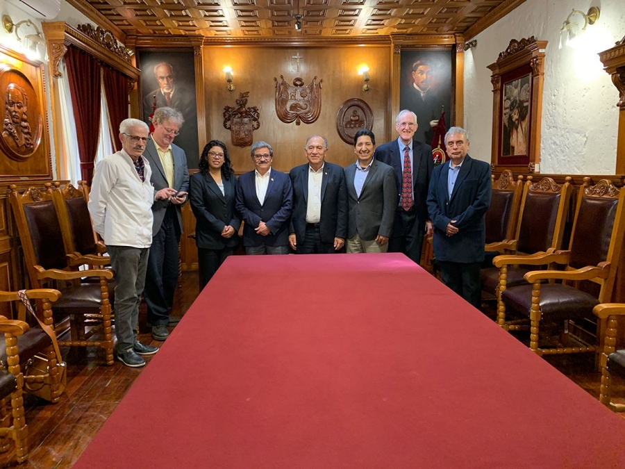 Professional associates together at research meeting.