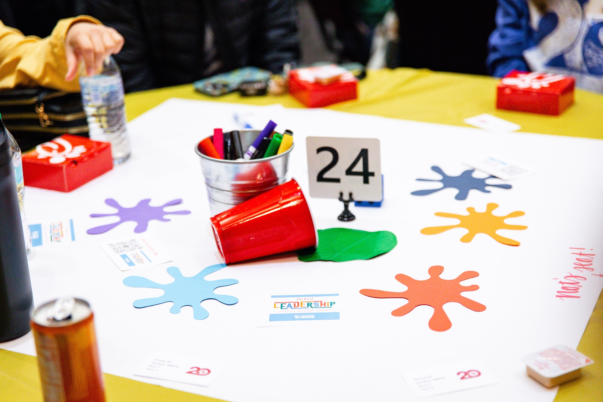 A photo of a table decorated for the 2025 Leader Summit. 