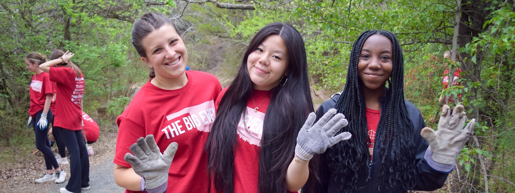 Students actively volunteering at a Big Event location.