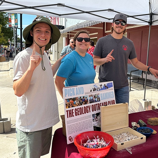 A group of students at a tabling event.