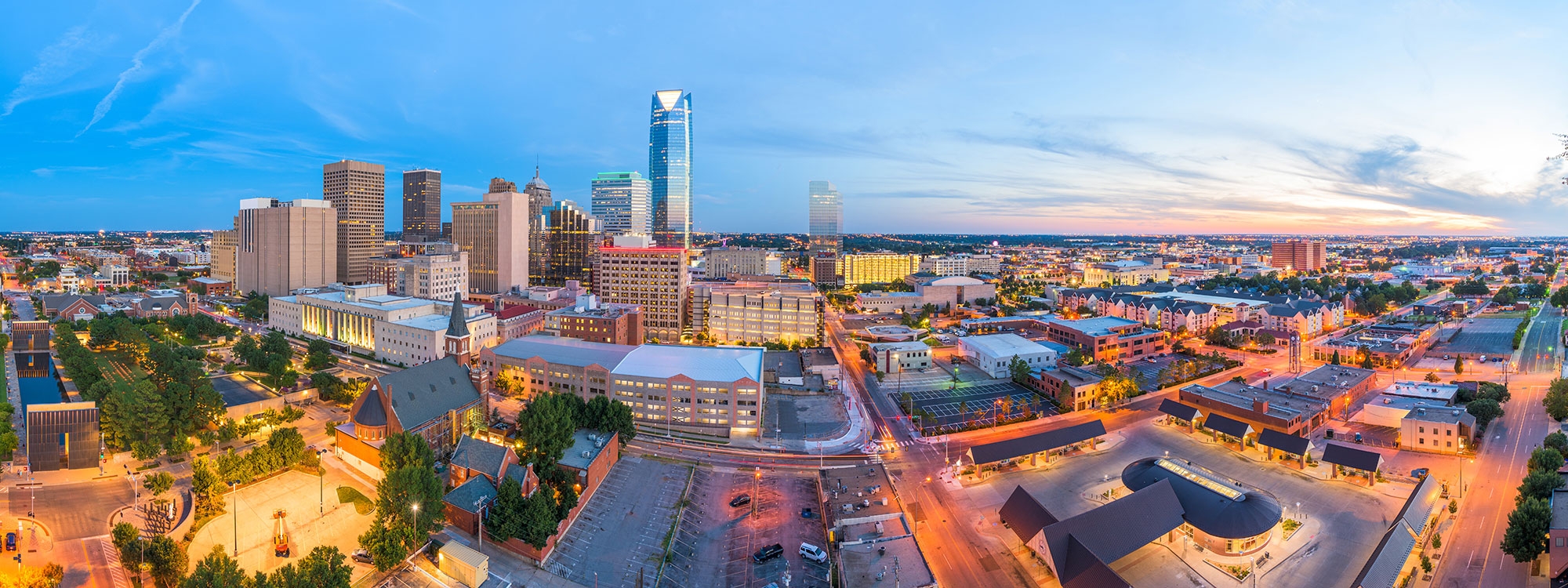 The skyline of Oklahoma City at dusk.