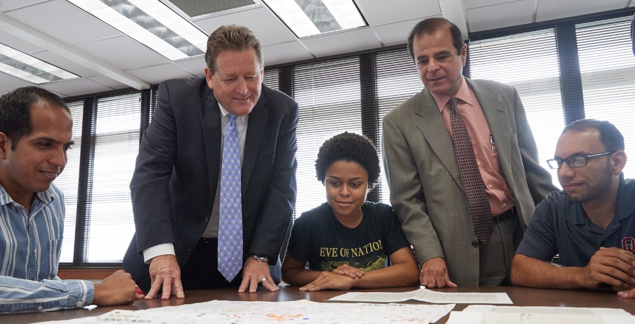 Mike Stice and Ronnie Irani with students.