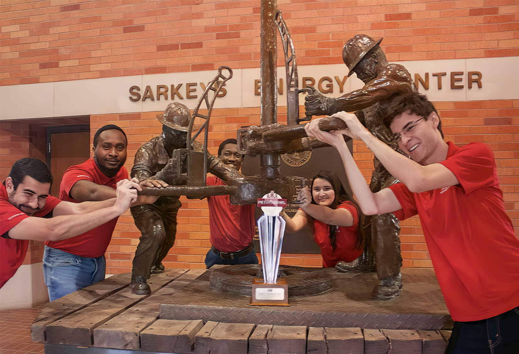 Mewbourne students with PetroBowl trophy.