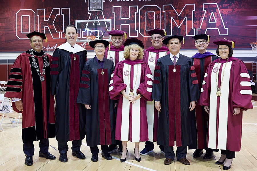Members of the OU Board of Regents, OU President Joseph Harroz Jr., Honorary Degree recipients Maj. Gen. Theresa Carter and Ronnie Irani, and 2023 Commencement speaker Randall Stephenson.