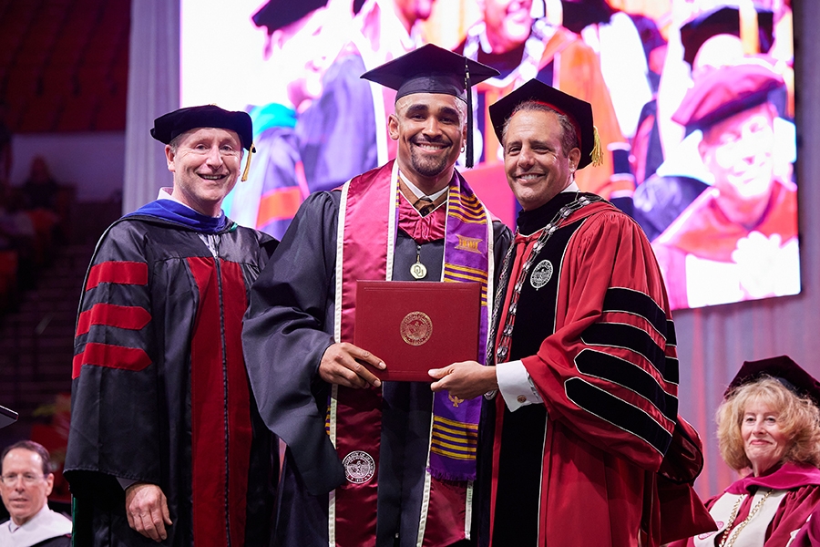 Jalen Hurts, former OU football player and current quarterback for the Philadelphia Eagles, receives his Master of Human Relations degree.