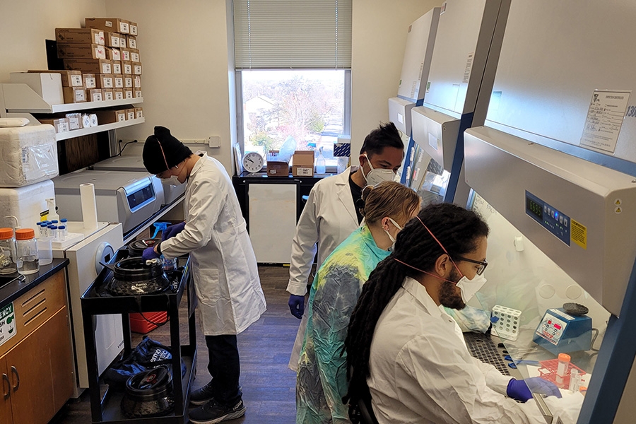 Laboratory personnel at OU analyze samples of wastewater to look for foodborne pathogens like Salmonella.