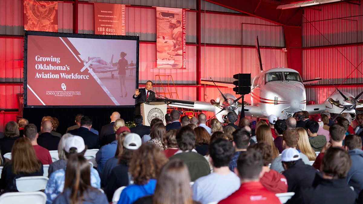 OU President Joseph Harroz announces aviation program growth at the Max Westheimer Airport.