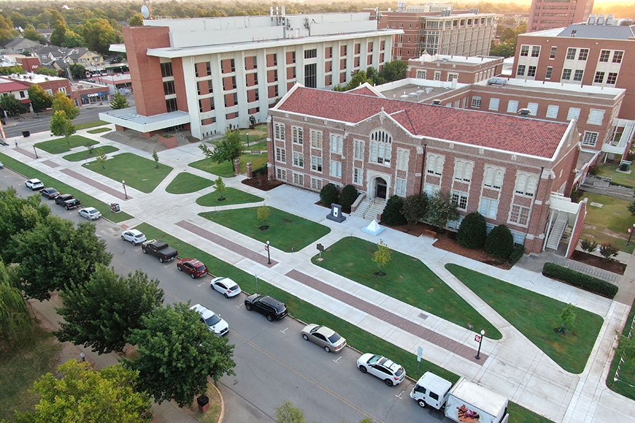 A drone photo of new sidewalks along some buildings. 
