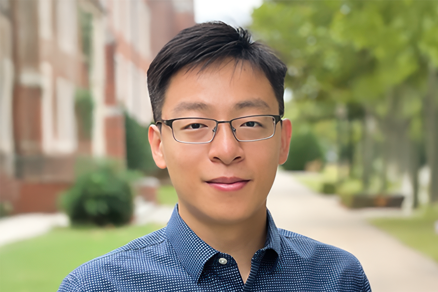 A headshot of Dong Zhang. 