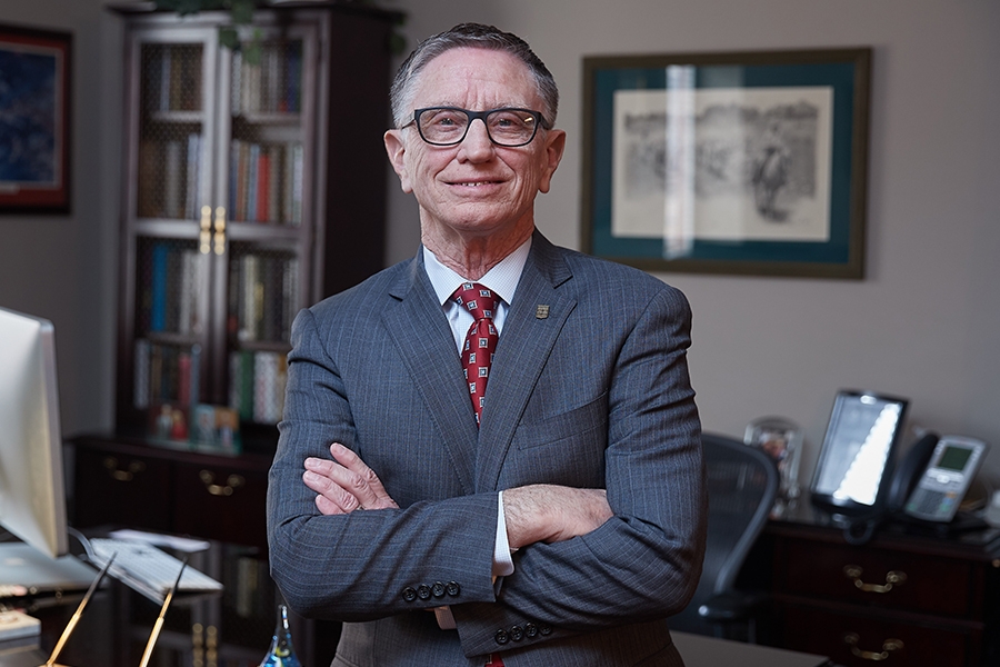 Thomas Landers standing in an office setting. 