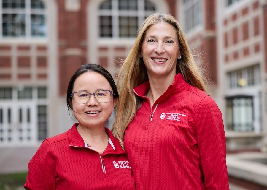 Qiong Wang and Natasha Poularika pose for a photo.