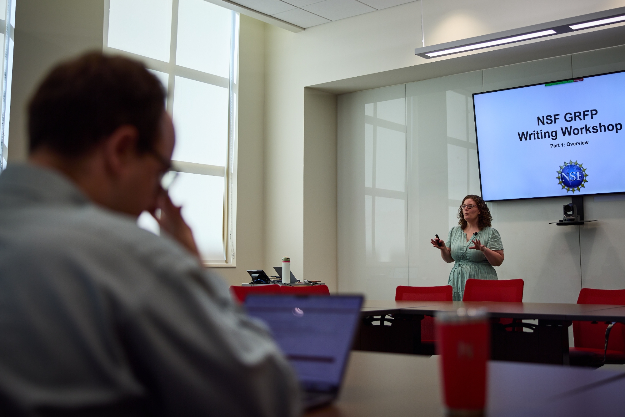 Rebecca Scott presenting.
