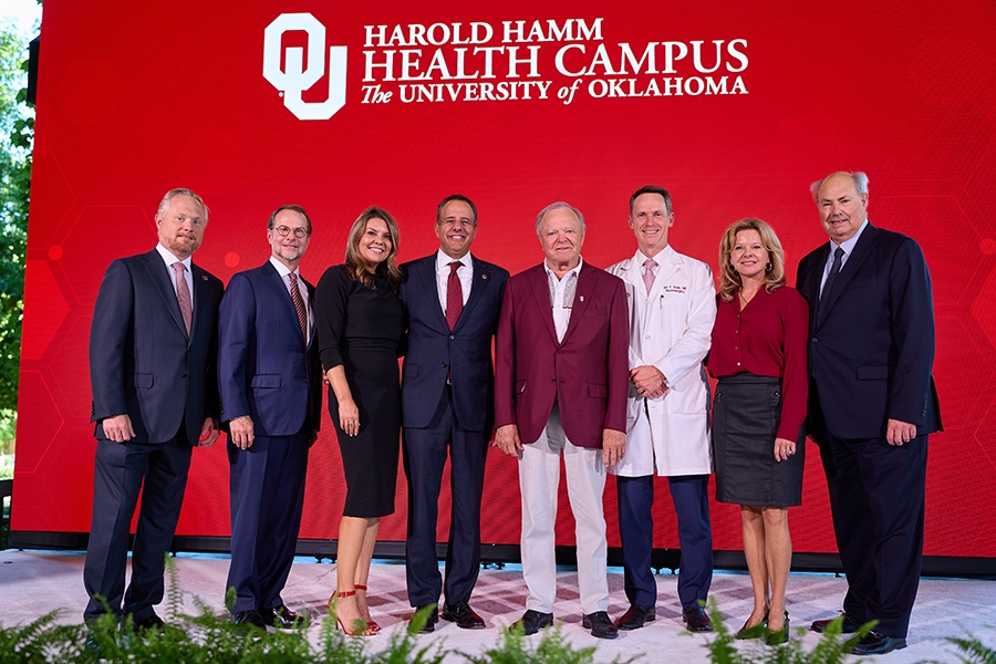 University of Oklahoma Regent Dustin Hilliary, University of Oklahoma Regent Rainey Williams, Ashley Harroz, University of Oklahoma President Joseph Harroz, Jr., Harold Hamm, Executive Dean of the University of Oklahoma College of Medicine Dr. Ian Dunn, Shelly Lambertz, and Senior Vice President and Provost for the Harold Hamm Health Campus at the University of Oklahoma Dr. Gary Raskob. pose for a group photo.