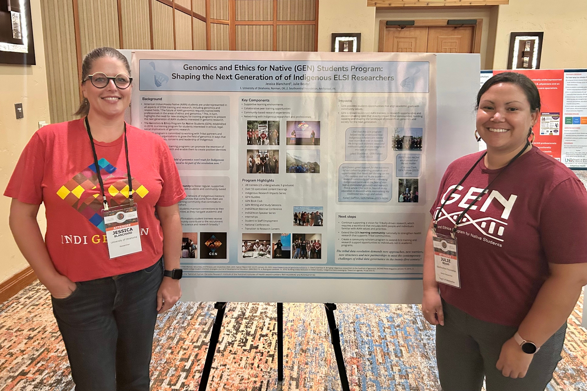 Two people standing in front of research poster. 