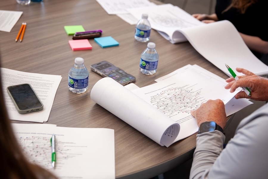 Representatives read through the data collected by Xiaochen Angela Zhang, Ph.D.